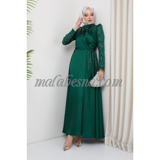 Green evening dress with attached skirt with shining stones